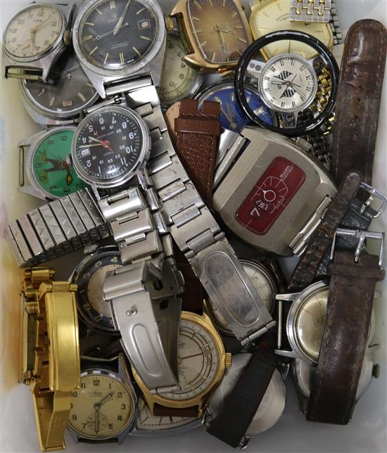 A Mickey Mouse watch and various other wrist watches.